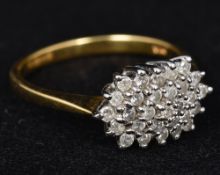 An 18 ct gold diamond cluster ring