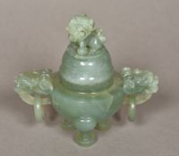 A Chinese carved jade twin handled censo