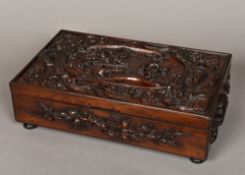 A late 19th century Chinese carved hardw