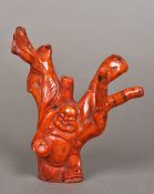 A Chinese carved red coral figure Model