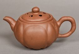 A Chinese Yixing pottery teapot