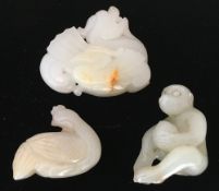 Three Chinese jade carvings Comprising: