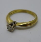 An 18 ct gold and diamond ring