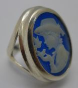 A silver and blue cameo ring