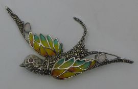 A plique a jour silver bird brooch