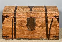 A late 18th/early 19th century iron bound Continental pine trunk With hinged domed top and with