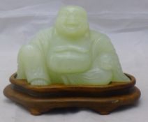 A carved jade model of Buddha,