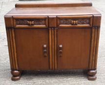 An Art Deco oak sideboard