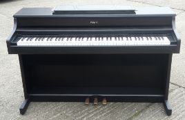 A Roland HP-7e electric piano