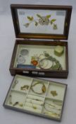 A box of various jewellery, coins, etc.