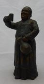 A 19th century painted terracotta model of a jolly monk