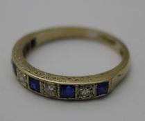 An 18 ct sapphire and diamond set ring