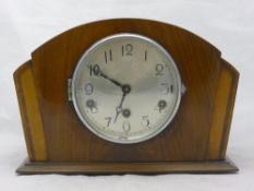 An Art Deco walnut mantle clock