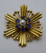 A 9 ct gold pearl and sapphire set sunburst brooch