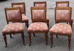 A set of six Victorian oak dining chairs