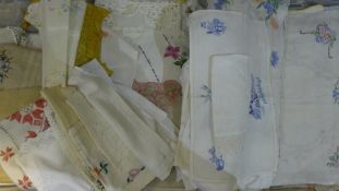 Four boxes of vintage linen, lace, etc.