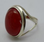 A red stone dress ring