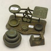 A set of Victorian brass postal scales and various weights