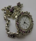 A silver and marcasite watch