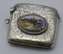 A silver vesta depicting a hunting scene