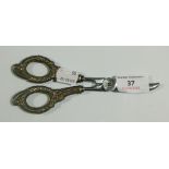 A pair of silver handled grape scissors