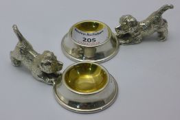 A pair of silver plated dog form salts