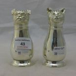 A pair of silver plate cat and dog salt and peppers