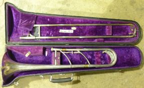 A cased Frank Holton Revelation trombone