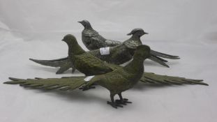 A pair of silver plated pheasants,