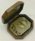 A boxed sundial compass
