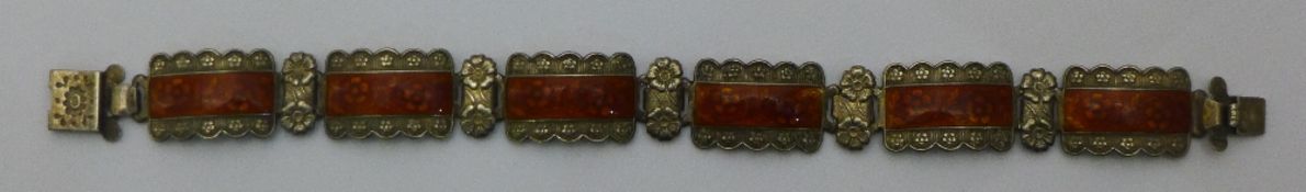 A silver and enamel bracelet