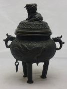 A Chinese bronze dog-of-fo topped censor