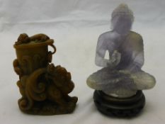 A Chinese hardstone Buddha and a carved hardstone mythical beast