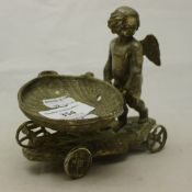 A Victorian silver plated cherub wheeled bon bon server