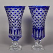 A pair of Bohemian cut blue and clear overlay glass vases Each of castellated waisted trumpet form