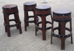 A set of four bar stools