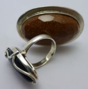 Two silver dress rings