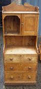 A Victorian pine side cupboard with drawers