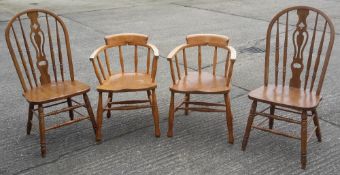 A pair of modern high back Windsor chairs