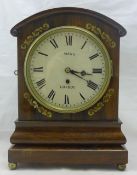 A Victorian rosewood bracket clock
