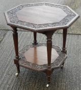 A Victorian octagonal carved oak centre table
