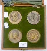 A cased set of Italian bronze medallions