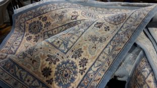 A large blue ground rug