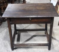An 18th century oak single drawer side table