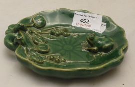 A Chinese green porcelain lily pad and frog dish