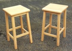 A pair of modern stools