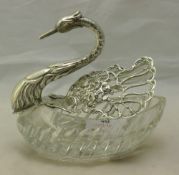 A silver mounted cut glass swan posy