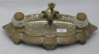 A Victorian Elkington & Co silver plated inkwell centred with an elephant mask