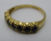 A 9 ct gold sapphire inset ring