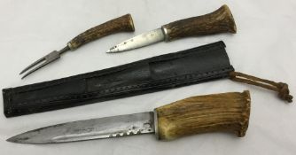 A Continental hunting knife The steel blade with antler handle,